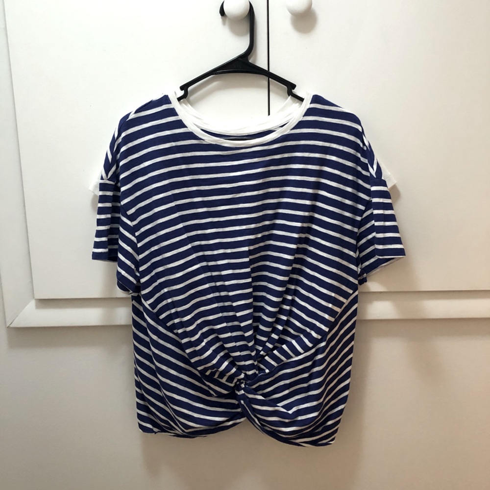Blue and white stripped t shirt. Gathers in front